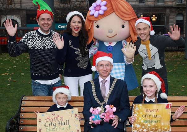 Lord Mayor Brian Kingston is joined by Lily of Lilys Driftwood Bay, the Cool FM Breakfast Team and Corey Courtney and Lauren Picking from Springfield PS at the launch of the Christmas Lights Switch-on in Belfast.