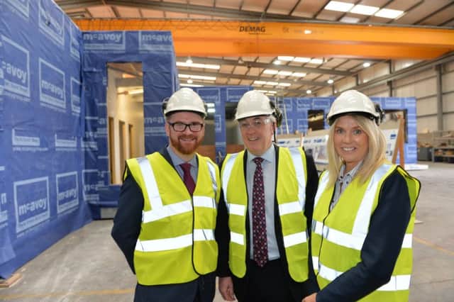 Mr Hamilton pictured recently with Orla Corr and Eugene Lynch of the McAvoy Group which has announced expansion plans