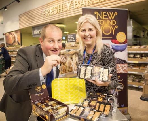 Rodney Cupples of Tesco NI with New Found Joy owner Carol Little