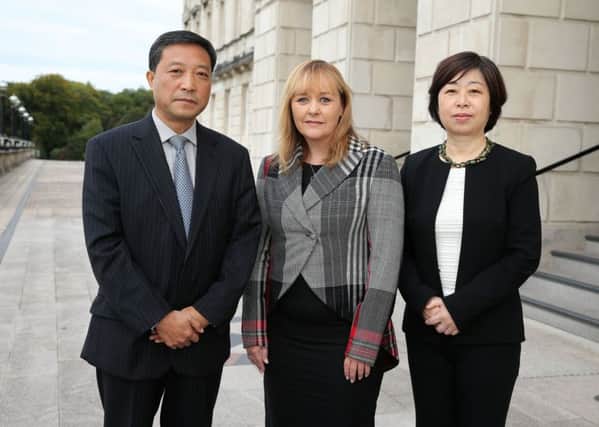 Press Release Image   Press Eye Belfast - Northern Ireland   20th September 2016   Photographer Kelvin Boyes / Press Eye   Minister for Agriculture, Environment and Rural Affairs Michelle McIlveen welcomed a delegation from China's Jiangxi Province to Stormont today. The delegation - which includes agricultural officials and food company executives - is in Northern Ireland to learn about the agri-food industry and livestock production in particular.  The Minister is pictured with Mr Hu Hanping, director General of Jiangxi Provincial Agricultural Department, who is leading the delegation, and Madam Wang Shuying, Chinese Consul-General in Belfast.