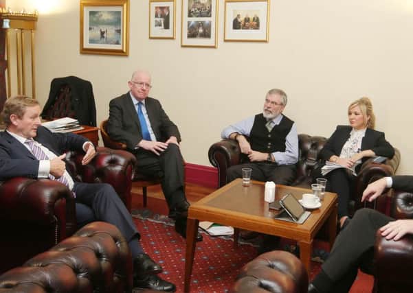 Press Eye Belfast - Northern Ireland 3rd November 2016

Taoiseach Enda Kenny visits Stormont to hold a meeting with Sinn Fein over Brexit.  

Left to right.  Taoiseach Enda Kenny, Irish Minister for Foreign Affairs and Trade Charlie Flanagan TD,  Sinn Fein President Gerry Adams, Health Minister Michelle O'Neill and Deputy First Minister Martin McGuinness pictured in his office during the meeting. 

Picture by Jonathan Porter/Press Eye