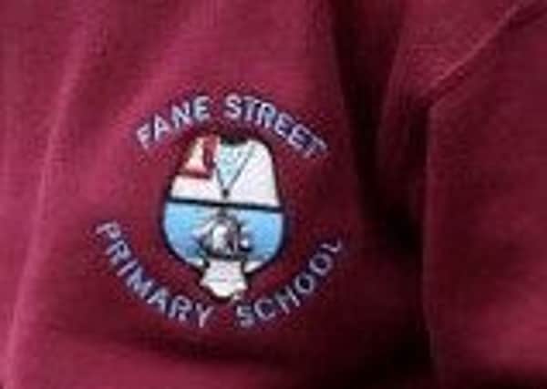 Fane Street Primary School badge.