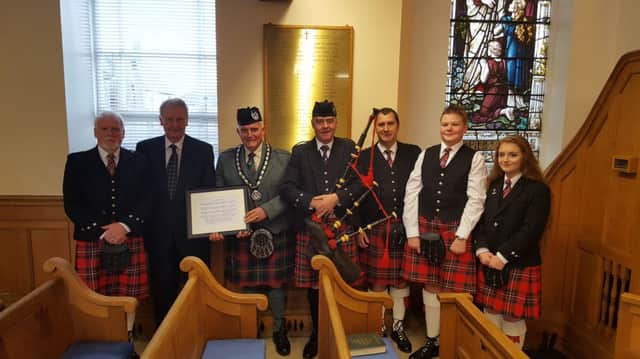 William Dickey (Broughshane & District Pipe Band), George McMullan (Clerk of Session) Winston Pinkerton (RSPBANI President), Ian Burrows (RSPBANI Project Manager), Colin Cupples, Ryan Taylor and Laura Barr ((Broughshane & District Pipe Band).(Image submitted)