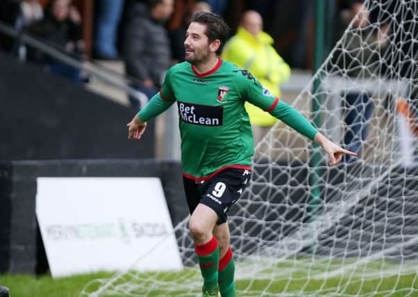 Gareth predicting another good day for Glentoran's Curtis Allen.  Picture by Jonathan Porter/Press Eye