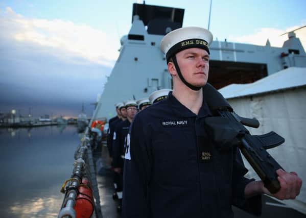 Crew members aboard HMS Duncan, as four Nato warships have docked in Belfast after monitoring a Russian aircraft carrier through the North Sea and on to the Mediterranean. Picture date: Friday November 4, 2016. Photo credit: Brian Lawless/PA Wire