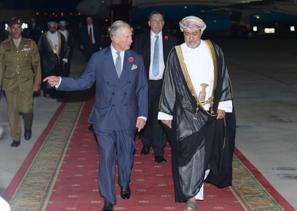 The Prince of Wales (left) walks with HH Sayyid Haitham bin Tariq bin Taimur Al Said, after arriving at Muscat International Airport in Oman, to begin an official tour on behalf of the British Government with his wife the Duchess of Cornwall. PRESS ASSOCIATION Photo. Picture date: Friday November 4, 2016. Charles and Camilla will undertake 50 engagements in seven days during their visits to the Sultanate of Oman, the United Arab Emirates and the Kingdom of Bahrain. Photo credit: John Stillwell/PA Wire