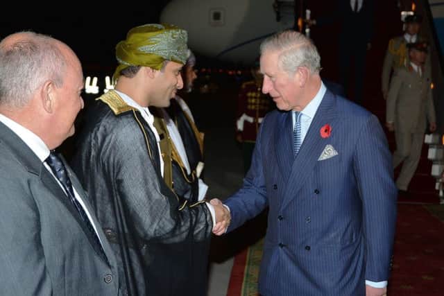 The Prince of Wales shakes hands with a local dignitary, after arriving at Muscat International Airport in Oman, to begin an official tour on behalf of the British Government with his wife the Duchess of Cornwall. PRESS ASSOCIATION Photo. Picture date: Friday November 4, 2016. Charles and Camilla will undertake 50 engagements in seven days during their visits to the Sultanate of Oman, the United Arab Emirates and the Kingdom of Bahrain.  Photo credit: John Stillwell/PA Wire