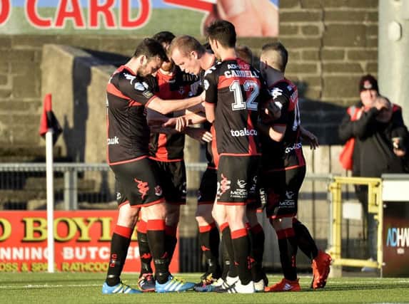 Crusaders' Jordan Owens celebrates after heading his side into a 1-0 lead. (

Photograph by Stephen Hamilton/Presseye)