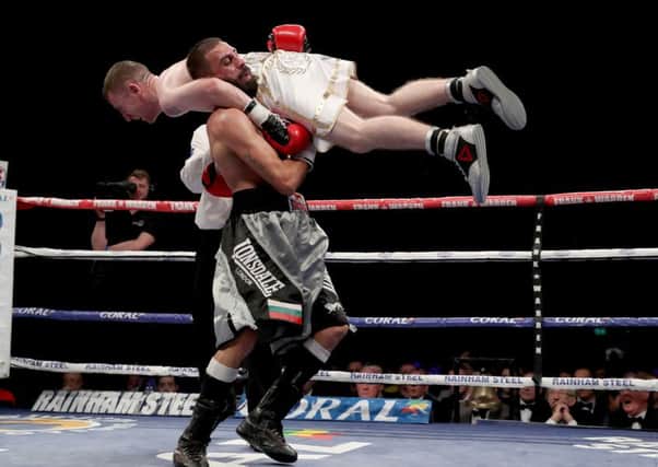 Photo by William Cherry.  Paddy Barnes defeats Stefan Slachev after he was disqualified for lifting him during Saturday nights Flyweight Contest at the Titanic exhibition Centre, Belfast. Presseye