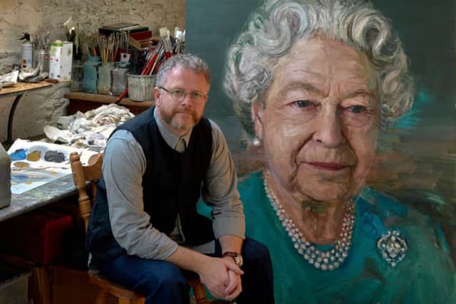Colin Davidson pictured with the painting in his Co Down studio before it left for London last month