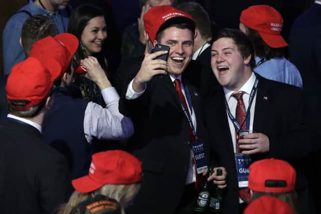 Donald Trump supporters at his election night rally in New York celebrate as his victory is confirmed