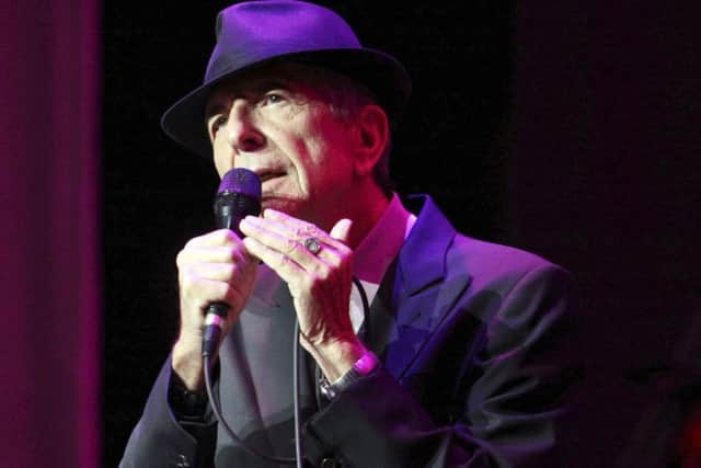 Leonard Cohen pictured in 2013 performing in Atlanta - the revered singer and songwriter has died aged 82 (AP)