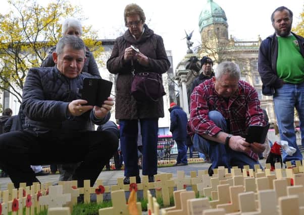 Up to 1,000 people attended the Armistice Day service at Belfast City Hall