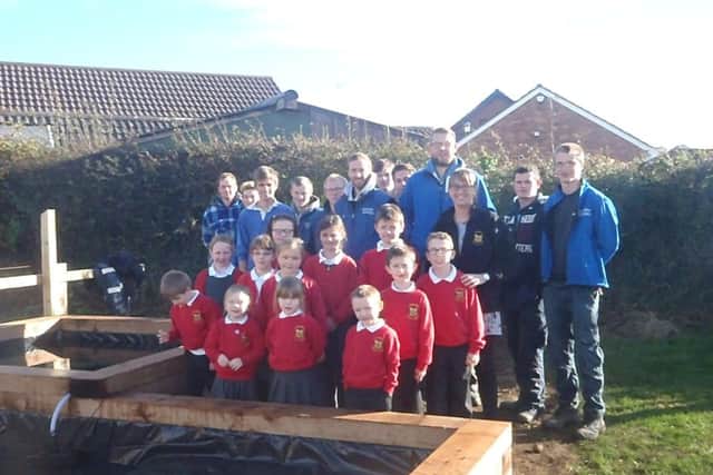 Horticulture students form Greenmount Campus, Antrim with pupils and Eco-club members from Carnmoney Primary School and their teacher, Miss Lynn Bannon.