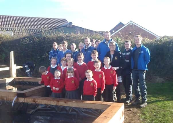 Horticulture students form Greenmount Campus, Antrim with pupils and Eco-club members from Carnmoney Primary School and their teacher, Miss Lynn Bannon.