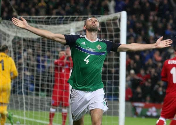 Northern Ireland Gareth McAuley celebrates scoring against Azerbaijan