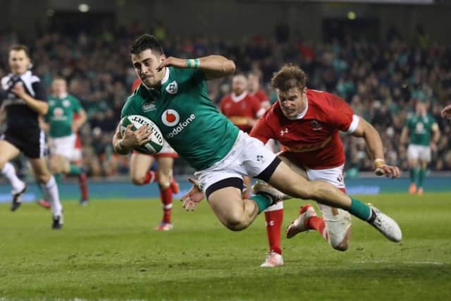 Ireland's Tiernan O'Halloran scores a try
