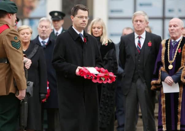 Secretary of State James Brokenshire attended Belfast City Hall's Remembrance Sunday event