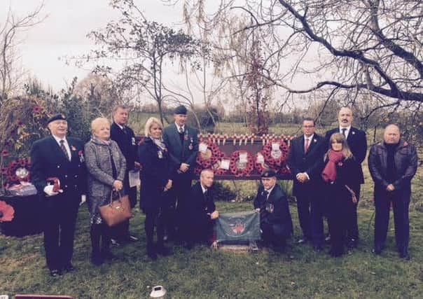 First Light Infantry members at the site of the 1988 IRA Ballygawley bomb for an act of remembrance on 13 November 2016. James Leatherbarrow (middle of picture with beret) suffered severe injuries but survived the bomb. Also pictured are other members of the regiment and their partners, with Neil Tattersall, survivor of the 1992 Manchester bomb (far right in black jacket.)