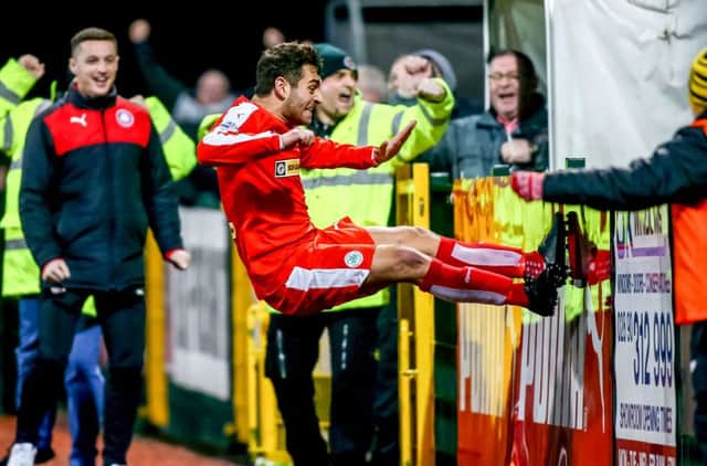 Cliftonville's David McDaid celebrates his late winner in unique style. (Photo by Kevin Scott / Presseye)