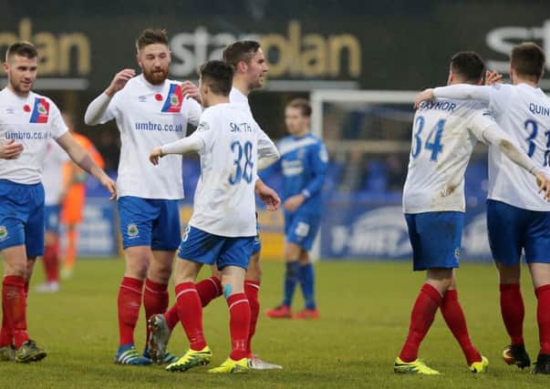 Celebration time for Linfield at Stangmore Park on Saturday. Pic by PressEye Ltd.