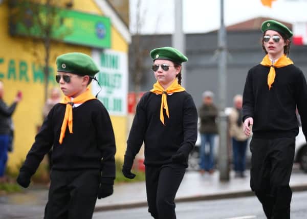 Children in paramilitary uniforms take part in the 25th Anniversary Commemoration parade for IRA member Patricia Black in Belfast. Pic: Kevin Scott / Presseye.
