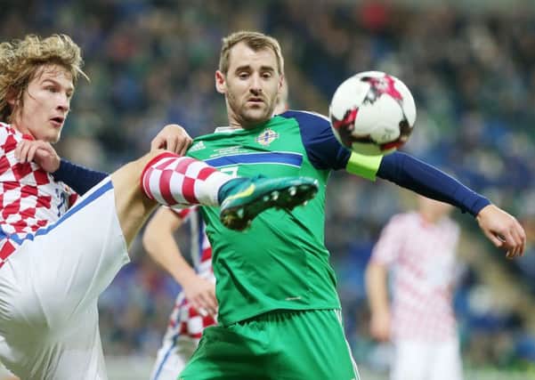 Northern Ireland's Niall McGinn with Croatia's Tin Jedvaj