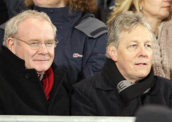 Martin McGuinness (left) said Peter Robinson should give evidence at the Dublin hearing