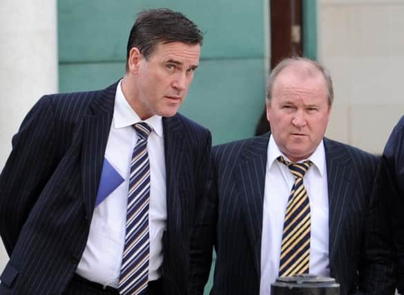 Michael, left,  and John Taggart pictured outside the High Court in Belfast after an earlier hearing in 2013