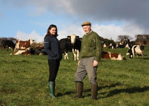 Chloe Kyle Grassland AGRO and David Stewart, J.A. Stewart & Sons, appreciate the quality of the late autumn grazing for the Stewart dairy herd in Kircubbin.