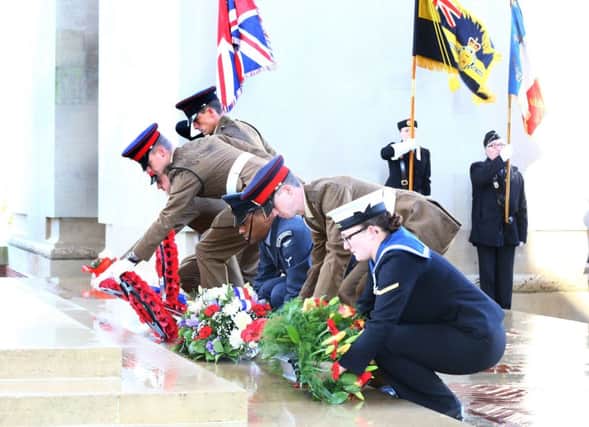 Members of the Armed Forces lay wreaths during the service at the Thiepval Memorial in northern France to mark the centenary of the final day of the Battle of the Somme