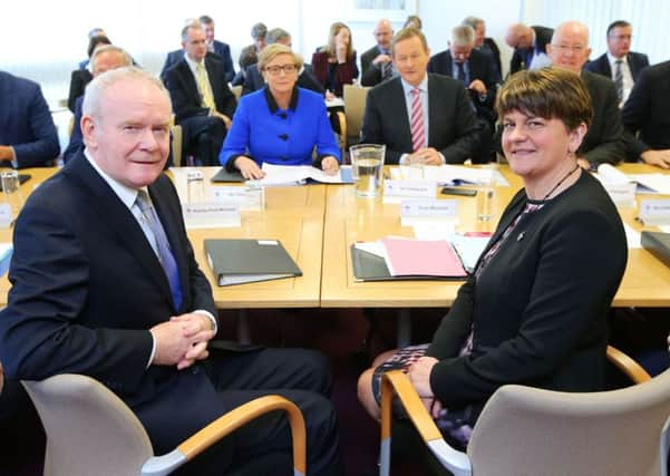 Arlene Foster and Martin McGuinness sit opposite their Dublin counterparts at the Armagh meeting