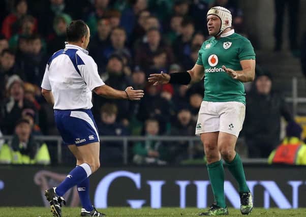 Ireland captain Rory Best talking to Referee Jaco Peyper after a  New Zealand  try