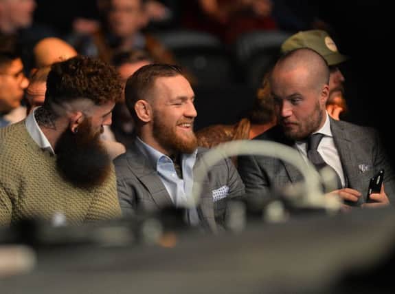 Conor McGregor enjoying the UFC Fight Night at the SSE Arena in Belfast.. Pic Colm Lenaghan/Pacemaker  INBM 48-792-CON
