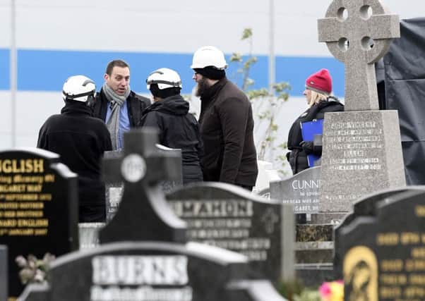 Pacemaker Press 21/11/2016
Padraig Ã® Muirigh  at Milltown cemetery  as Police forensic teams  begin exhuming the body of Daniel Rooney, Mr Rooney was shot dead by the Army in 1972  at  the St James Crescent area of west Belfast. His Body is being exhumed as part of an investigation into the Military Reaction Force (MRF).
There was a chance a bullet would be found in the coffin, said a solicitor representing Mr Rooney's family.
Pic Colm Lenaghan/Pacemaker