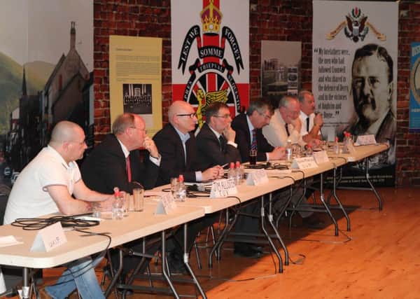 TUV leader Jim Allister (second from left) pictured between PUP and UPRG representatives at a public meeting of the Unionist Forum in 2013