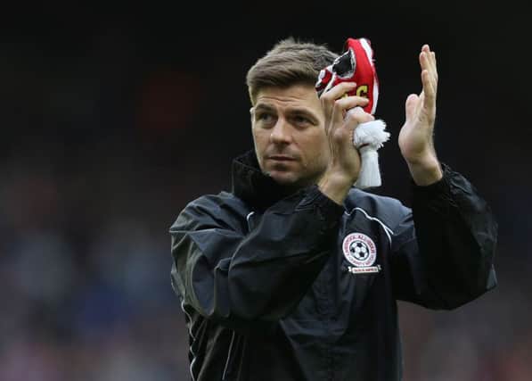 File photo dated 29-03-2015 of Steven Gerrard. PRESS ASSOCIATION Photo. Issue date: Thursday May 7, 2015. Liverpool's departing captain Steven Gerrard admits it will be difficult for him to let go of his long association with his boyhood club but he intends to return in some capacity in the future. See PA story SOCCER Liverpool. Photo credit should read Barrington Coombs/PA Wire.