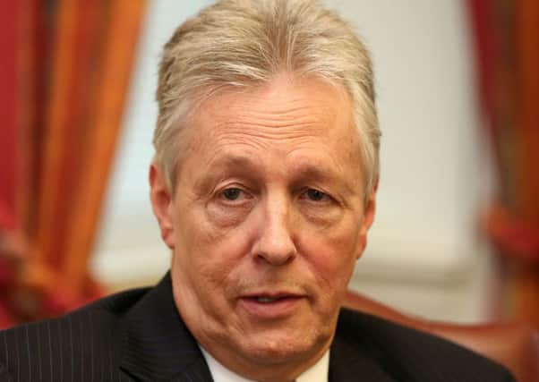 File photo dated 19/11/2015 of Northern Ireland's outgoing First Minister Peter Robinson who has been shortlisted for the international peace prize, Tipperary International Peace Award, it has been announced. PRESS ASSOCIATION Photo. Issue date: Friday January 1, 2016. Robinson, who is due to retire this month, has been recognised for his political contribution over four decades. The citation for the prestigious Tipperary International Peace Award hails his role in the formation of the coalition government at Stormont, most notably overseeing the devolution of policing and justice powers from Westminster to Stormont in 2010. See PA story IRISH Peace. Photo credit should read: Niall Carson/PA Wire