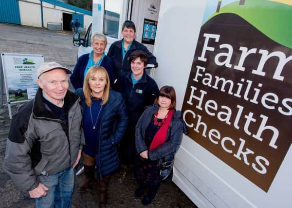 Farm Family Health Check stops off at Saintfield mart and meets its 12,000th client, Downpatrick farmer Laurence Murray. The Health Check Programme is funded by DAERA and delivered in conjunction with the Public Health Agency (PHA). Pictured from left-right are; Laurence Murray, DAERA Minister Michelle McIlveen, nurses Sylvia Moore and Lorna Barr, Doreen Bolton, nursing co-ordinator and Diane McIntyre, PHA Programme Manager