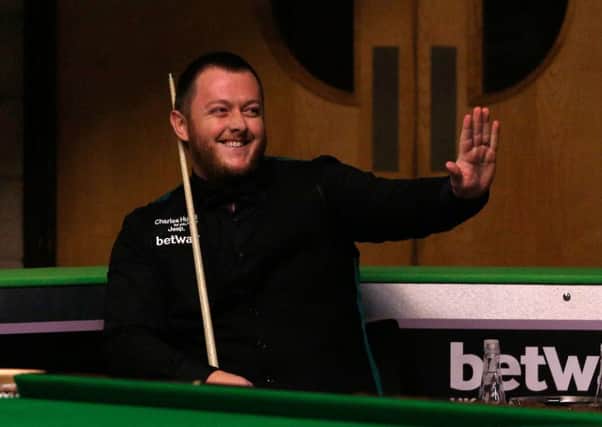 Mark Allen waves to the crowd after making a break of 147 during day five of the Betway UK Championships at the York Barbican.