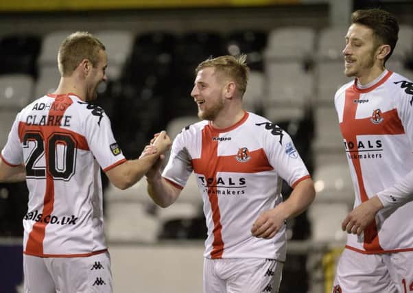 Crusaders David Cushley celebrates after his first goal against PSNI.