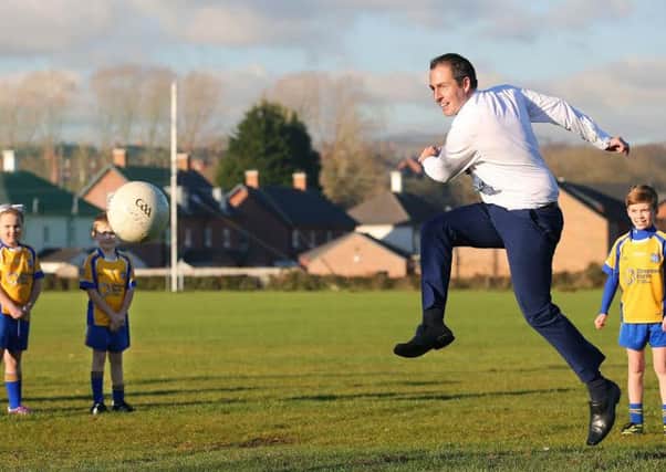 The DUPs Paul Givan tries his hand at Gaelic football last week, and the GAA are exploring new ways to make the sport even more accessible