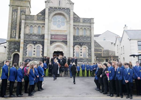 Press Eye Belfast - Northern Ireland 29th November 2016  Funeral of Reece Meenan at Star Of The Sea Church in Portstewart.  The 13-year-old died after run over in a hit and run incident in Coleraine on Saturday evening.   Reece's coffin enters the church for Requiem Mass flanked by pupils fro his school Loreto College  Picture by Jonathan Porter/Press Eye