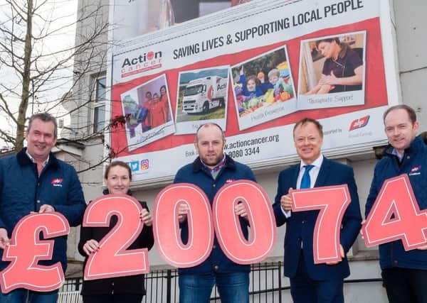 Action Cancer has dedicated a billboard in Banbridge in acknowledgement of the achievement. Pictured in front of it are, from left, Niall Kearney, Ann Cunningham and Philip Simpson ABP; Dougie King, Action Cancer and Roger Sheahan, General Manager ABP Newry