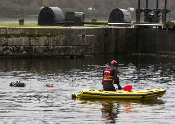 Rescue workers at Victoria Lock in Newry on Sunday