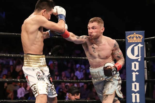 Carl Frampton in action against Leo Santa Cruz