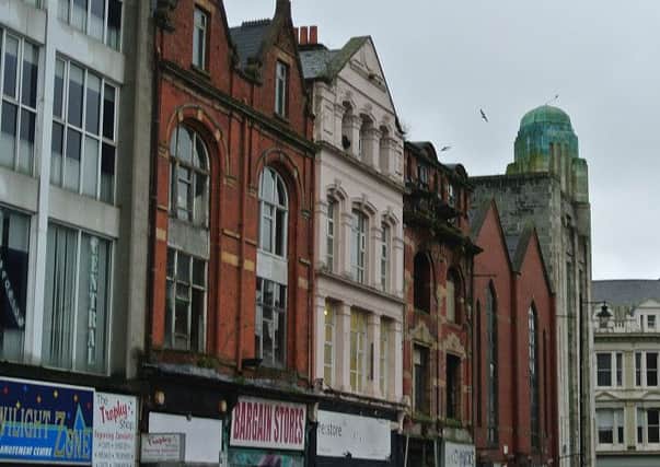 The three buildings (centre of picture) which were demolished in North Street, Belfast