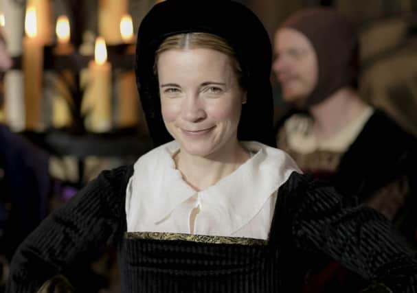 Lucy Worsley in period dress for her dramatic look at the king's six wives PA/BBC/Laurence Cendrowicz