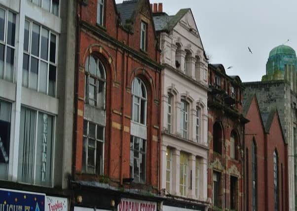 The three buildings (centre of picture) which were demolished in North Street, Belfast