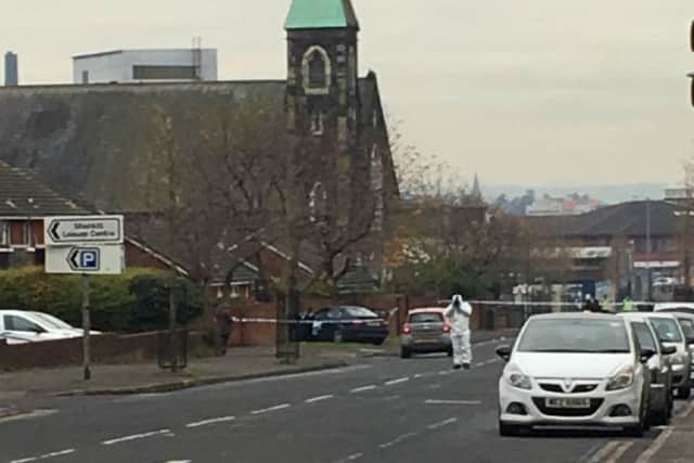 Forensic experts at scene of security alert in the Agnes Street area of the Shankill Road on Friday afternoon